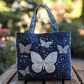Bolso artesanal con mariposa plateada